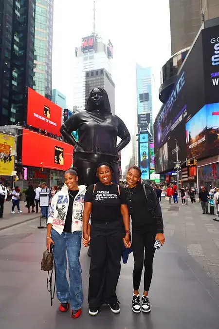 This picture is from May 2025 when I lead a student trip to NYC for our annual social justice trip. These young ladies had never been to New York City before and they were in awe of the complexity of the city. But, they were proud to see representation of their Black womanhood in Times Square. This is such a powerful picture that I include it in many lessons as a conversation starter. 