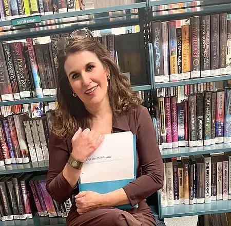 After years of giving talks to libraries about the science of reading, it feels full circle having one's book checked out of the library. DECLAN SOMEONE, a YA/ A fiction novel, will also be ready for bookstores and libraries in the spring of 2026. Here is Kate with the completed manuscript of her debut novel.