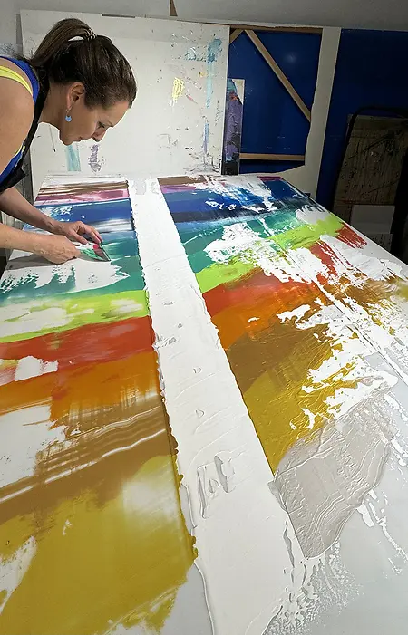 In my art studio, putting the finishing touch on my original "divine Light".  