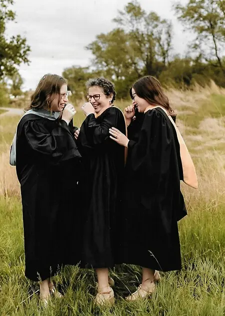 My daughters and I have an amazing relationship. Them 
becoming successful clinical mental health therapists who own their own businesses is my greatest pride. This photo captures how we generally are around each other....minus our gowns and hoods!