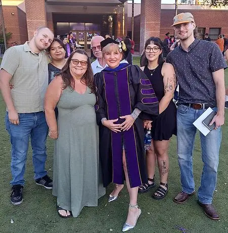 Having your whole family's support makes accomplishing goals easier and more worthwhile! I finished my PhD in July with the support and encouragement of my sons.