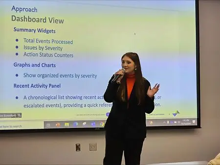 Photo of me presenting the Security AI solution to a panel of judges for the SAIC Joint Concept Challenge