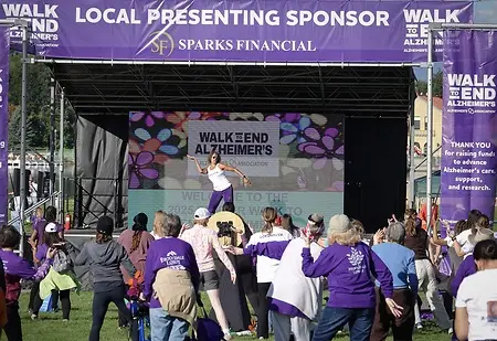 Davida leads the warm-up for the Walk to End Alzheimer's in Denver 2025