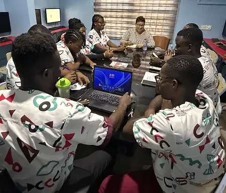 Strategic planning discussion with Mulan Smart Educational Center staff in Ghana