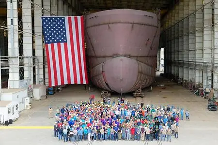 LaShip Crew in front of the first-ever US-built, owned, and crewed offshore wind service operations vessel (SOV). Jones Act qualified vessel.