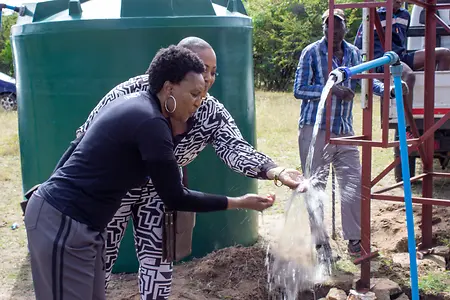 Lumbie Mlambo and board member Anita Hawkins visited Matobo Hills, where women and girls walk up to 18 miles each day to collect water. On this day, a major milestone was achieved—we located a sustainable water source within the community and constructed a water system to provide easier access to clean water.

Overcome with joy, Anita and Lumbie became the first to drink from the newly discovered source. This project now serves more than 8,000 people and has transformed daily life for women and girls by giving them back their time, dignity, and opportunity. We are deeply proud of this achievement and the lasting impact it has created for the community.