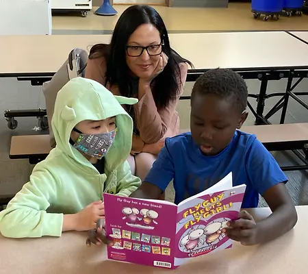 This 1st grader is reading to his "kinder buddy" and building confidence in reading, as well as joy for the magic of books. It is my honor to witness these powerful moments every day at work.
