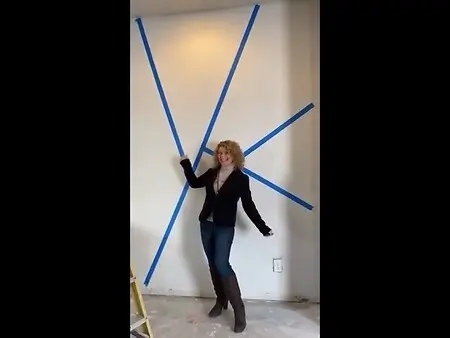 Laying out the dining room wall design for a lavender wallpaper- so much fun!