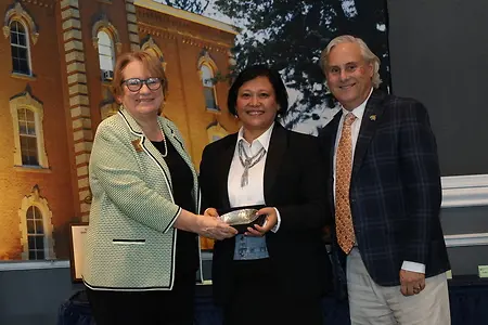 Receiving a Distinguished Staff Advisor / Mentor award from the President of Thiel College and Vice President of Marketing & Communication 