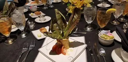 Red Romaine Caesar Salad wrapped in a toasted baguette crouton