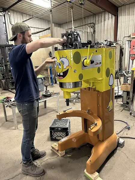 This is shop tech (and brother) AJ putting the finishing touches on the internals of our Viral SpongeBob mixer