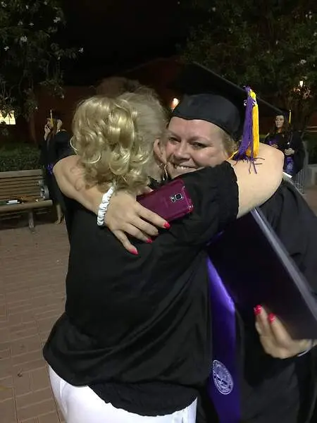 My mom's arms around me the night I graduated with my Master of Science — Magna Cum Laude. There are no words for what this moment meant. She believed in me when I wasn't sure I believed in myself. This one was for her. 🎓💜 #ColoradoChristianUniversity #MagnaCumLaude #Grateful #MomAndDaughter #NeverStopGrowing"