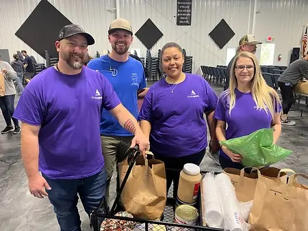 Volunteering at Crossroads Fellowship with fellow EB colleagues. 