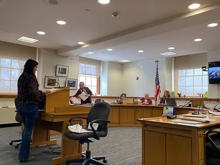 Giving testimony in support of expanding the child tax credit, at Maine Capitol, 