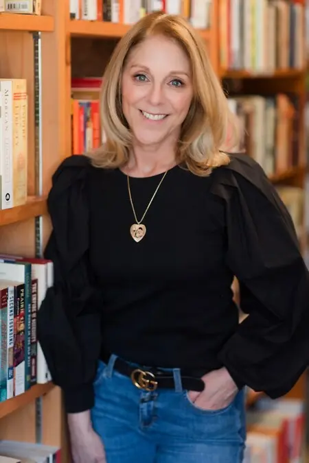 Donna Star surrounded by books!