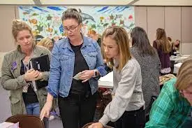 Dr. Jenny Pieratt working with teachers on designing engaging learning experiences for elementary school. 