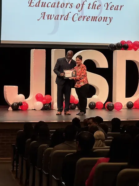 Shaking hands with the superintendent of Judson ISD as I was congratulated as Educator of the Year 2024-2025!
