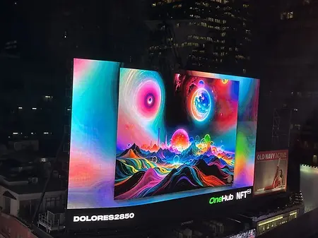 Cosmic Dance of Colors cover for video on New York Times billboard with NFTNYC2025.