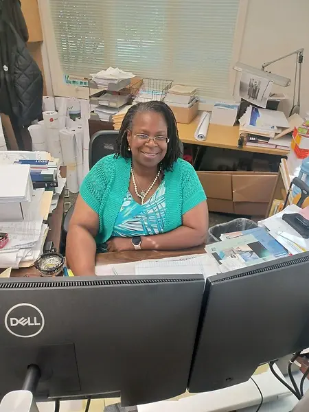 This is a picture of me in my office and it was used when I was feature in the ICC article Empowering Women: https://www.iccsafe.org/building-safety-journal/bsj-perspectives/empowering-women-kimberly-norman-rosedam-shares-her-experience-from-the-women-leaders-in-code-enforcement-symposium/?utm_medium=email&_hsmi=261718186&_hsenc=p2ANqtz-95tUcleNMVmrjBZeqbcJspl-ZArM5AoT1xNDbITspM7sjm7zJ8tYKq9JsVY-sTvAZ2HAW7ZLGiULi17NmO_08fhDQ7qg&utm_content=261718186&utm_source=hs_email 