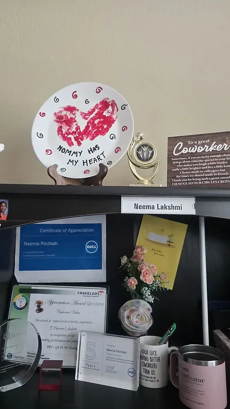 This space in my home office reminds me of treasured milestone moments - a perfectionist by nature, I pride myself in being a performer and as a colleague who genuinely networks with peers despite being remote. these are my cherished rewards and gifts from co-workers over the years