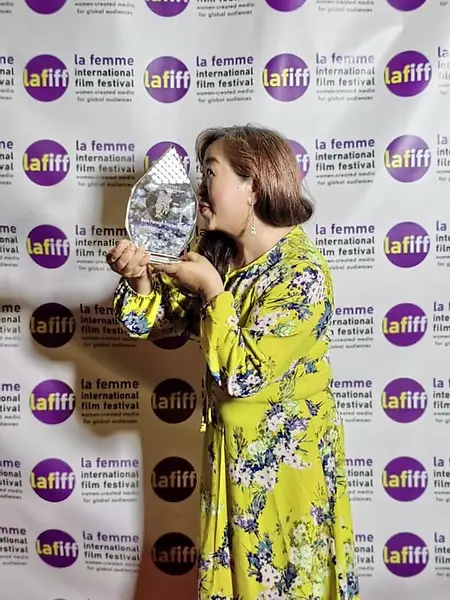won the Best Producer award at the LA Femme International Film Festival via film" Tibetan Hearts"