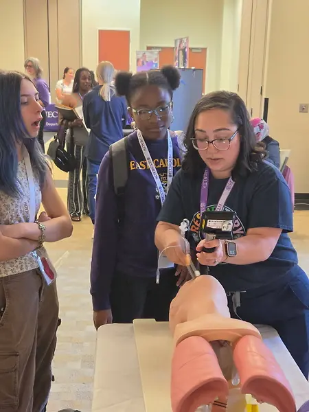 Teaching two young ladies about respiratory Therapy at our career expo. 