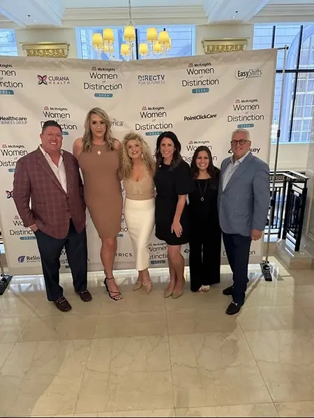Celebrating the rising star award from McKinghts Women of Distinction 
