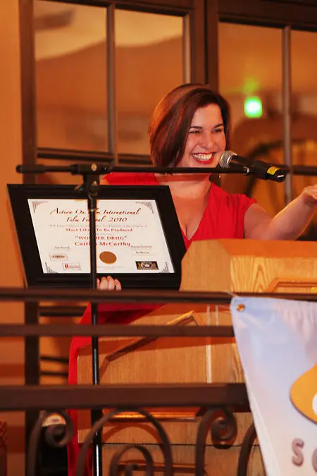 Caitlin McCarthy winning the "Most Likely to be Produced" award at the Action on Film International Film Festival.
