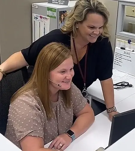 Lauren assisting one of her employees to be sure we give our customers the best experience possible.