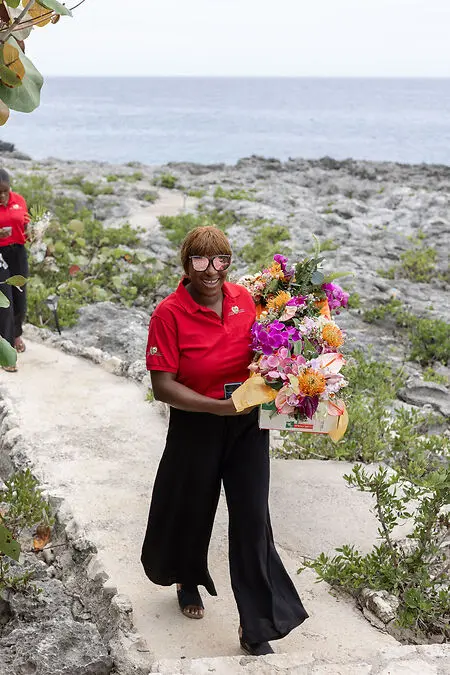 Taking bridal flowers to the bride room