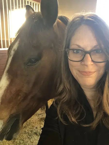 I'm happiest in the barn. Running a nonprofit that serves people through horses means I spend more time behind the computer than I do in a stall, but no matter where my "office" is, I'm fulfilled in knowing people are healing because of our work. 