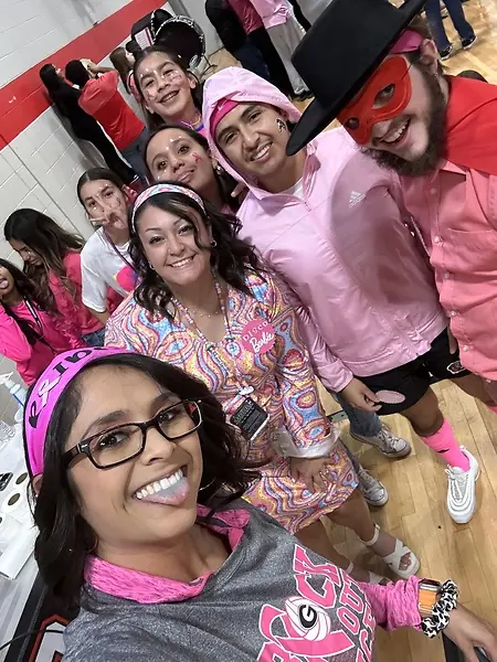 Participating in games during our students vs. staff Pink Out Pep Rally! 