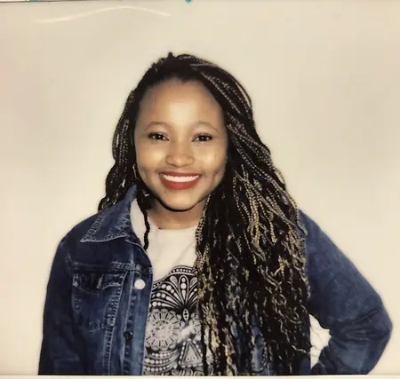 In my early 20s, I had left my hometown (Nairobi, Kenya) to pursue a career in technology. I landed in Vancouver, BC with two suitcases and a dream. Although I was new, I applied myself in every opportunity that I came across. This photo was taken at my digital marketing class where I first learned about the future of technology. 