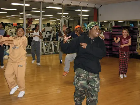 Carlena “CrazyCee” Gourdine training dancers during a high-energy work session at her professional dance training facility in New York.
