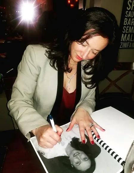 Signing doctoral manuscript for publication