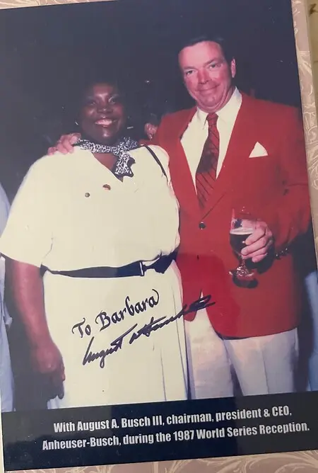 Barbara Washington celebrating St. Louis Cardinals World Series Game as guest of August A. Busch III at Busch Stadium.