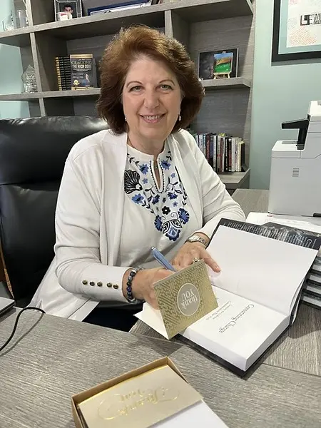 Mary Lou Panzano excited to be autographing her new book, Cementing Change, (BrickTower Press, April 2026).