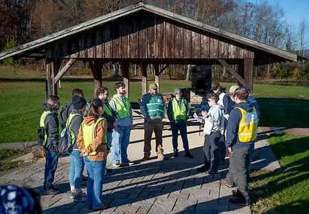 Behind the scenes of emergency management training in action. This photo captures one of the many full-scale exercises completed throughout my education at Penn College, where hands-on experience helped bridge the gap between the classroom and real-world emergency response.

During this exercise, I had the opportunity to serve as the Incident Commander for a simulated search and rescue incident involving lost and injured hikers. I coordinated operations, managed resources, and worked alongside fellow students to navigate a complex emergency scenario. Experiences like these have strengthened my leadership, decision-making, and incident management skills while preparing me for future opportunities in emergency services.

https://www.pct.edu/news/articles/2024/11/02/lost-hikers-emergency-managers-are-all-in
