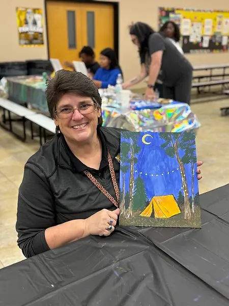 Learning to paint with students for our schools sip and paint night.