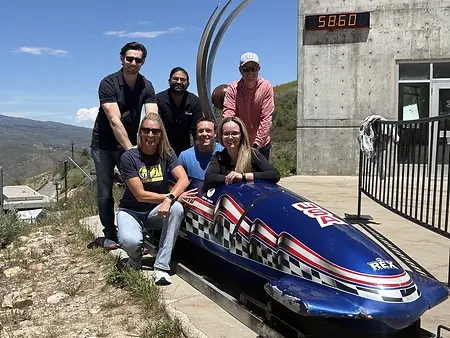 Great teams aren't built in conference rooms alone. Some of the strongest connections are forged by stepping outside your comfort zone, building new relationships, and tackling challenges together. Whether in business or on a bobsled track pulling 4-5 Gs through every turn, trust, teamwork, and shared experiences break barriers and create lasting impact.