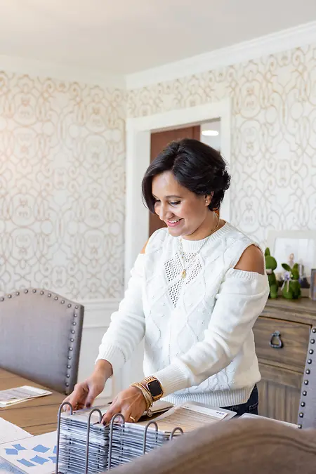 Designing and problem solving in action. In your home. Finding you the best window treatments for your decor.