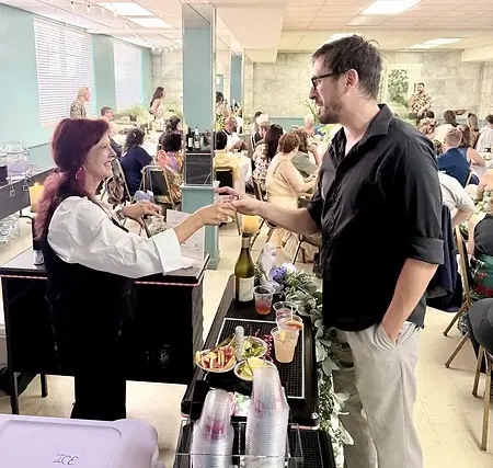 Valorie in her element, connecting with guests and creating memorable experiences through Let’s Flamingle Events & Mobile Bartending.