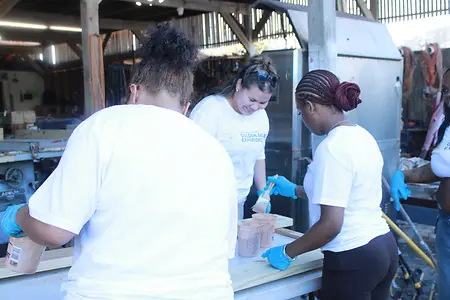 This photo was taken during the Golden Eagle Experience service trip to St. Thomas with SUNY Brockport’s Joey Jackson Intercultural Center. During our community service time, I worked alongside my peers at My Brother’s Workshop, a nonprofit organization that supports at-risk and high-risk youth in the U.S. Virgin Islands through mentorship, education, counseling and hands-on job training. We spent part of our time doing woodworking and other hands-on projects, which gave us the opportunity to contribute to the organization while learning more about the work they do in the community. It was a meaningful experience that reminded me how much can come from stepping outside of your own community, working alongside others and giving your time to something bigger than yourself.
