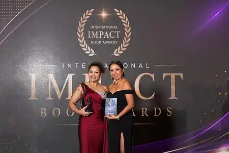 Author and inspirational speaker Marcia Regina Cook celebrates recognition for Dare to Dream with Eyes Wide Open at the International Impact Book Awards ceremony. Pictured holding her award, Marcia marks a meaningful milestone in sharing her story of resilience, faith, and the courage to pursue a new beginning.