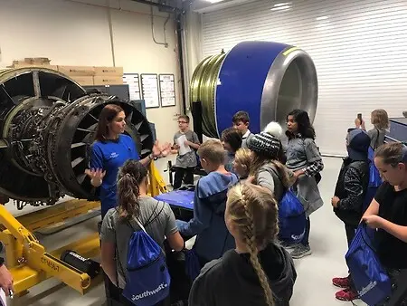 This was a group of middle school kids that were at Southwest for our Aviation Day Camp. I educated them on maintenance and focused on the Engine.