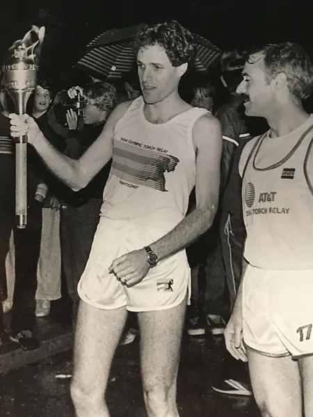 The '84 Olympics were on hand And the torch was crossing the U.S. On that first day the flame arrive, I carried it through Connecticut. Not a long run. But wow, it was electric. In this symbolic way I could support the Olympics. I still jog every morning. Carrying the torch in my own way.