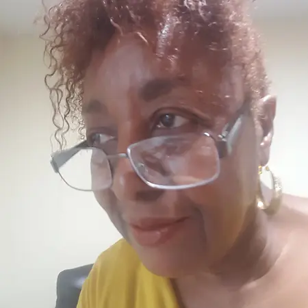 Marjorie Williams-Cooper Ph.D. ABD, M.A., B.A., DLitt. DLitt