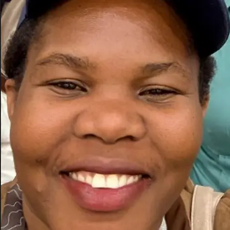 Dr. Maria A Komugabe