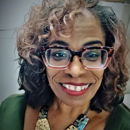 Melinda Sewer Muganzo, MBA, ABD